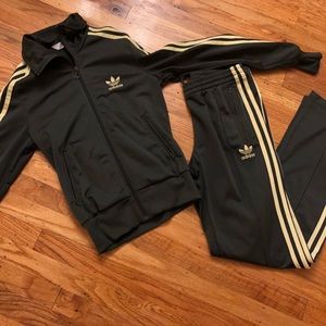 Woman’s adidas track suit